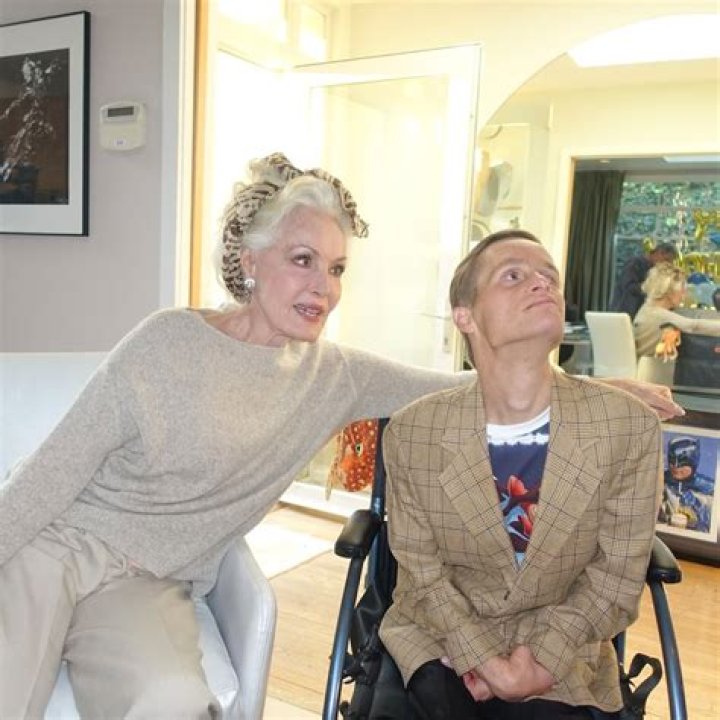Does Julie Newmar’s son live with her? What condition does Julie Newmar’s son have? Is Julie Newmar son still alive?